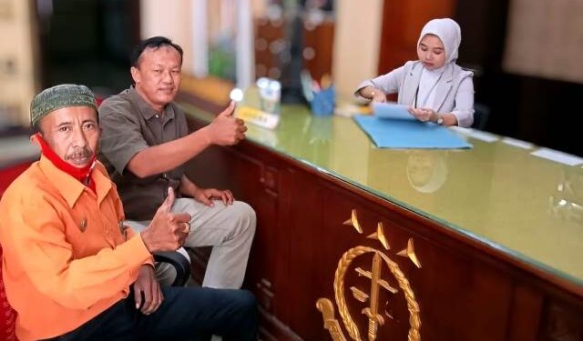 Supani dan Mukhamad Yunanto sebagai kuasa Suwanto saat menyampaikan laporan (istimewa)